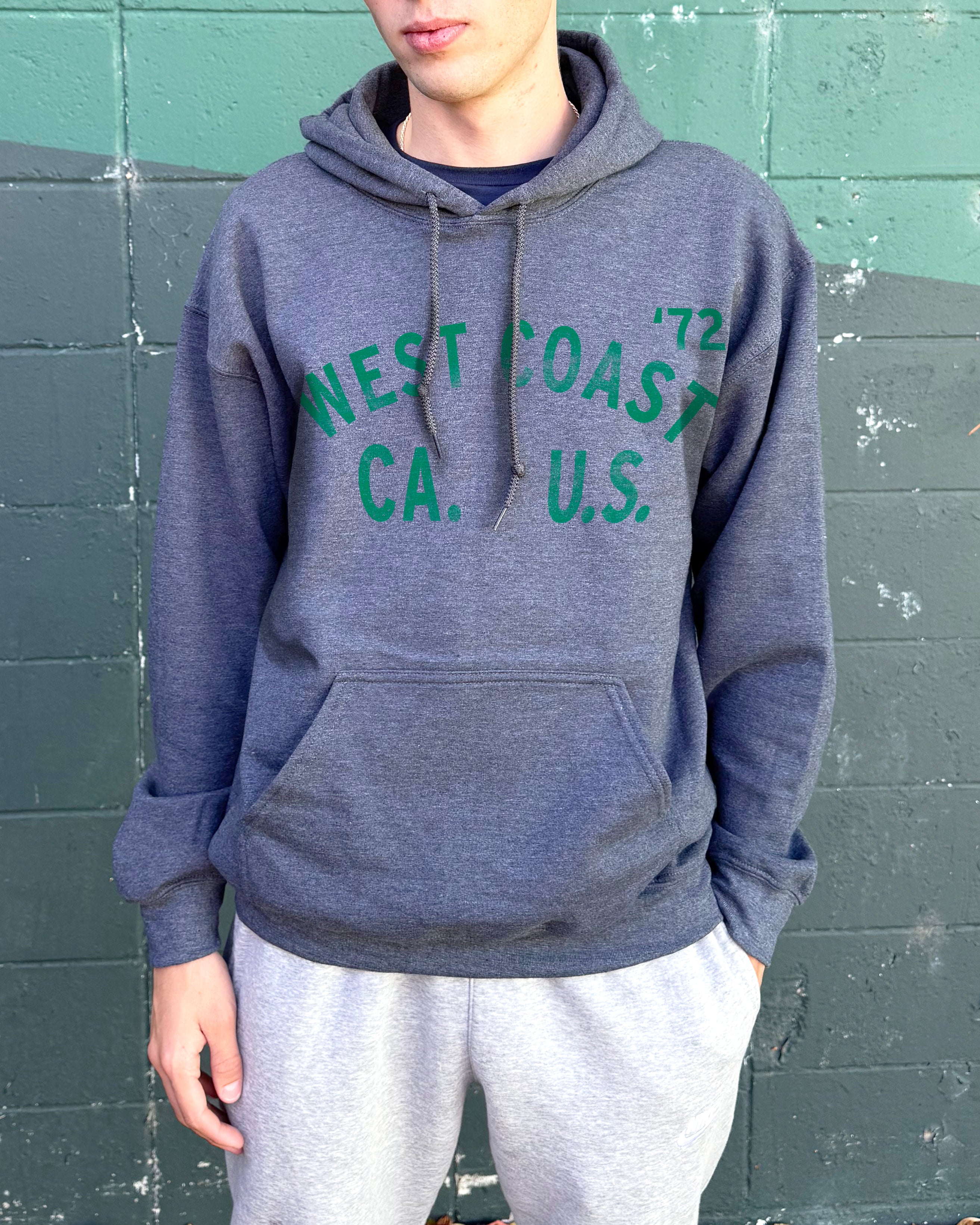 Grey sweatshirt pull over with green text